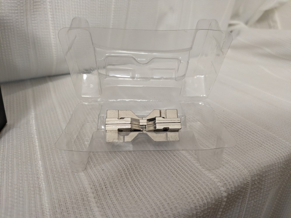 Hanayama Cast Hourglass puzzle with original box