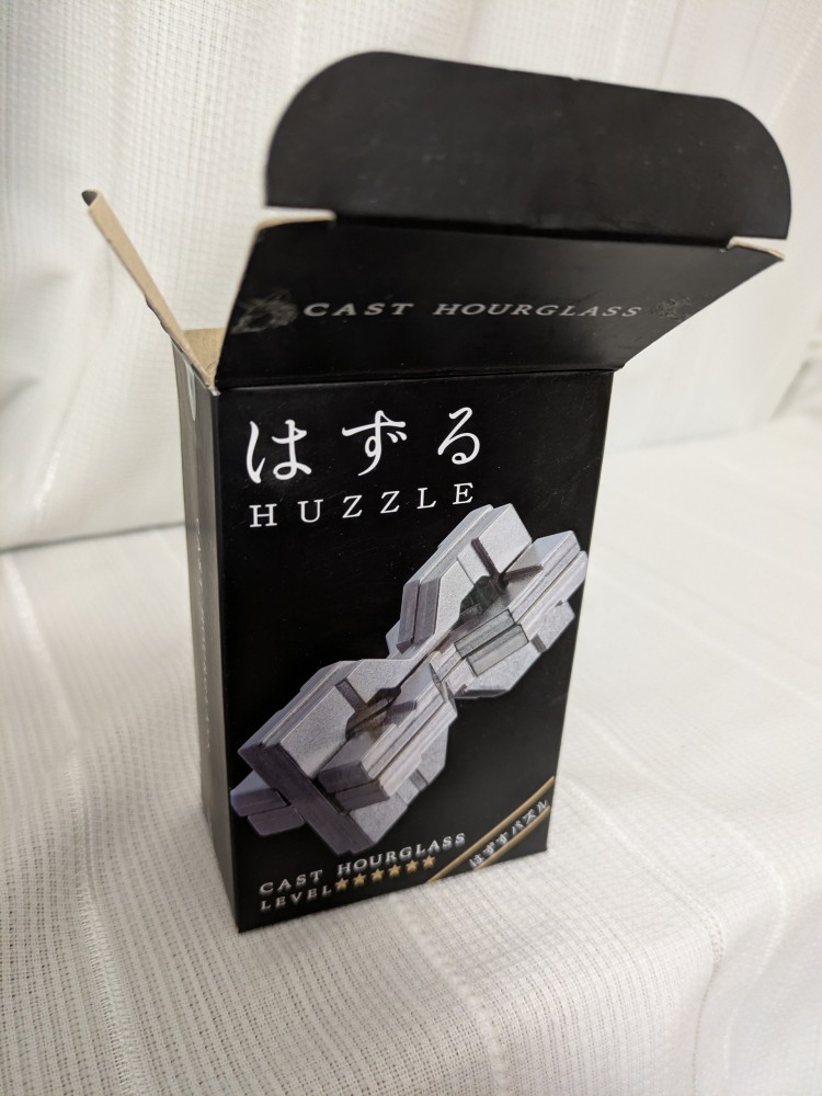 Hanayama Cast Hourglass puzzle with original box