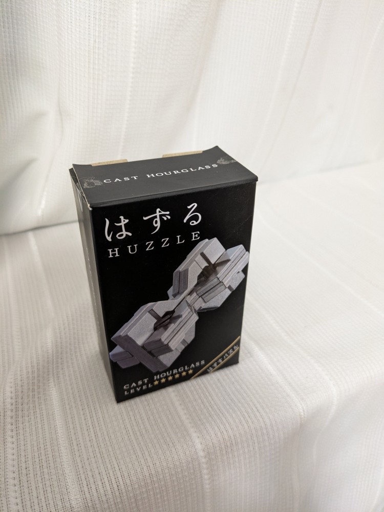 Hanayama Cast Hourglass puzzle with original box