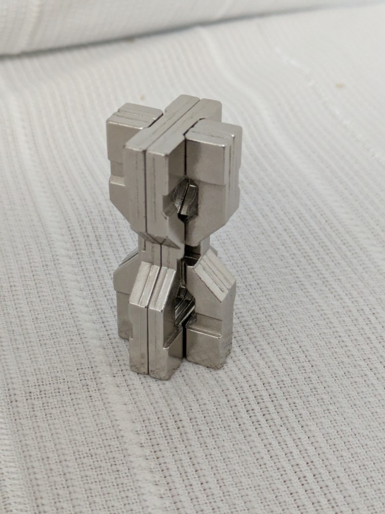 Hanayama Cast Hourglass puzzle with original box
