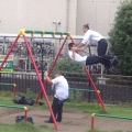 2014 jul 03 salarymen playing on swings