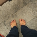 2019 jun 03 bare feet on granite paving stones