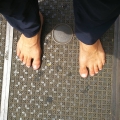 2019 jun 03 bare feet on patterned metal grate