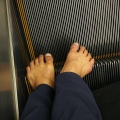 2019 jun 04 bare feet on escalator steps