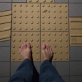 2021 nov 15 barefoot on yellow tactile paving
