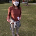 2021 oct 22 masked woman gesturing in park