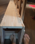 2021 sep 29 bare feet under wood art bench