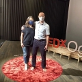 2021 sep 30 couple barefoot at tedx sign
