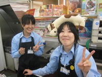 At Lawson's on Ai's head as new staff looks on