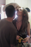 Natalie noses U-Cow at her and Lin's housewarming 15 June 2008