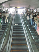 On escalator on opening day of Fukutoshin Line 14 June 2008