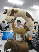 Uncle Cow riding a deer riding an elephant at work