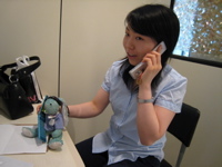 Francois and Naori on the phone in class