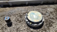 2021 apr 20 manhole cover placed before sidewalk