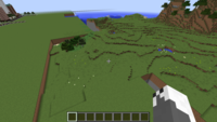 Screenshot in Minecraft showing boundary between flatland a regular terrain