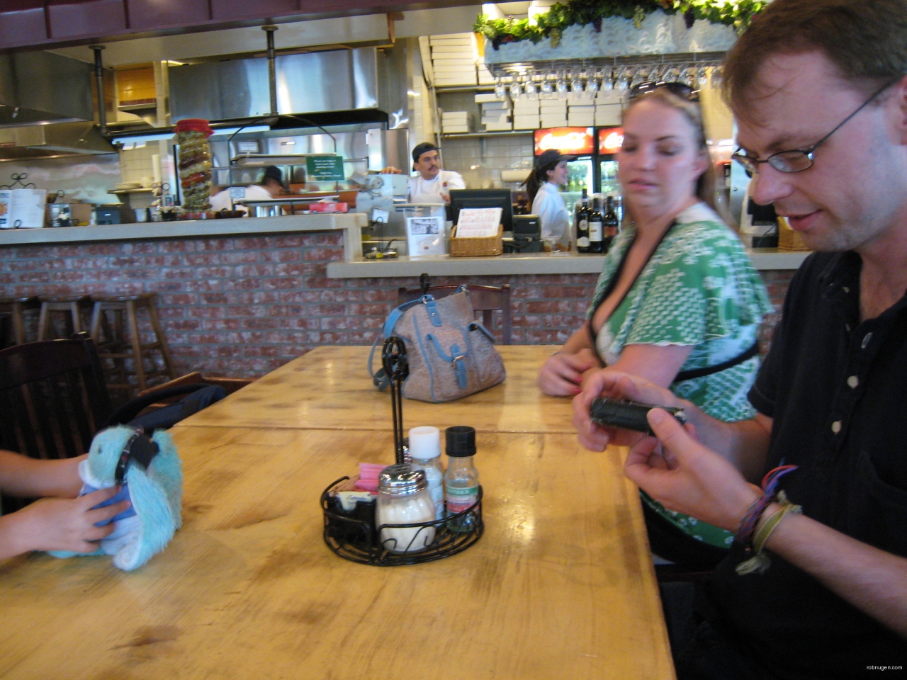 Fred inspects Rob's camera case