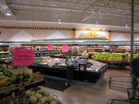 Ami and Francois in fruits and veggies