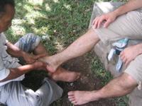 Francois supports Rob's foot massage